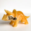 orange calcite dinosaur