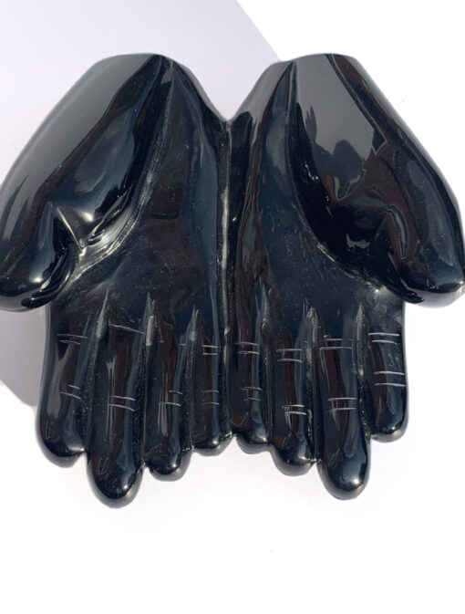 Obsidian double hand carving