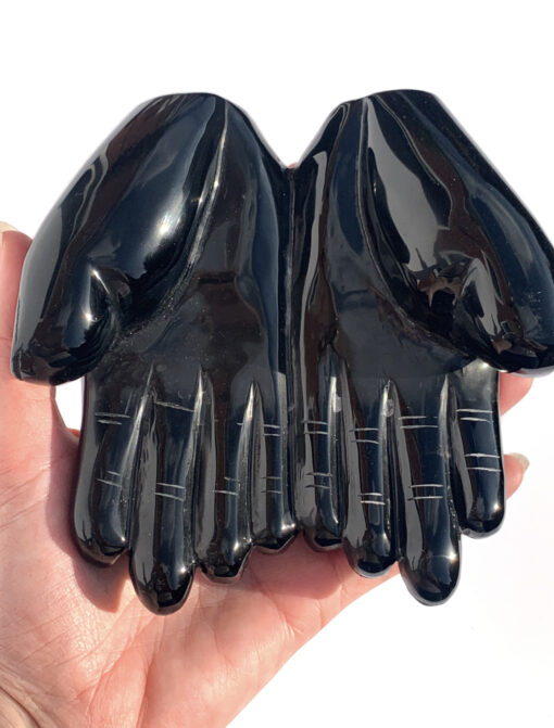 Obsidian double hand carving