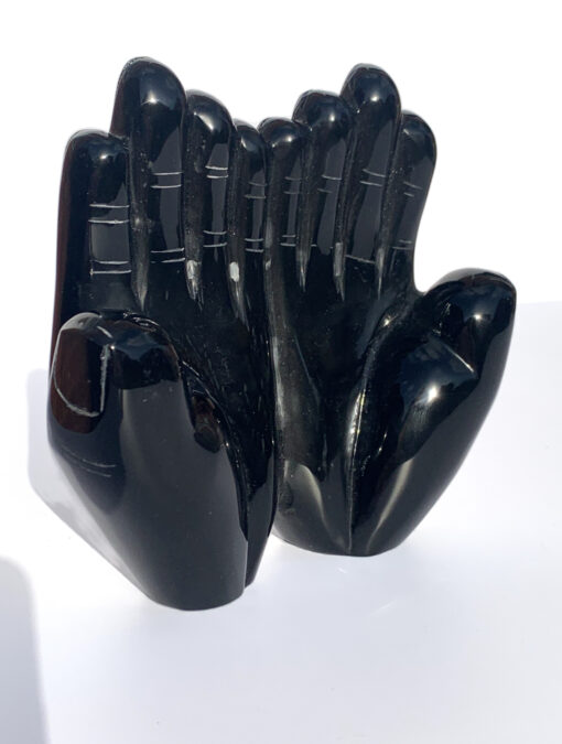 Obsidian double hand carving