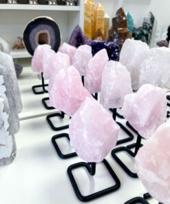 Raw Rose Quartz on stand