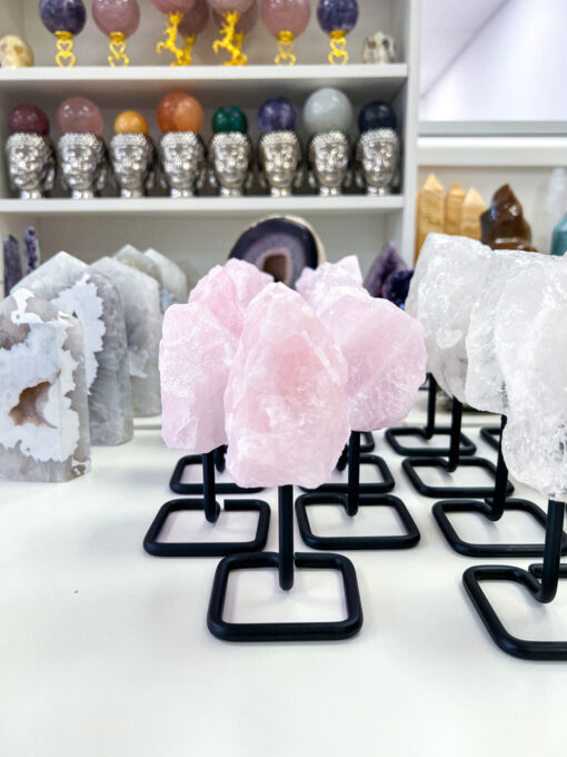 Raw Rose Quartz on stand