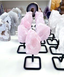 Raw Rose Quartz on stand