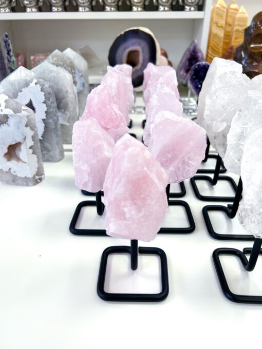 Raw Rose Quartz on stand