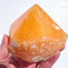 Orange Calcite half polished point