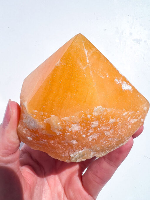 Orange Calcite half polished point