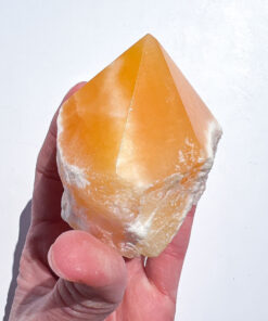 Orange Calcite half polished point