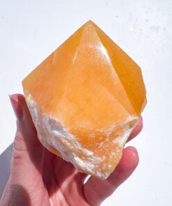 Orange Calcite half polished point