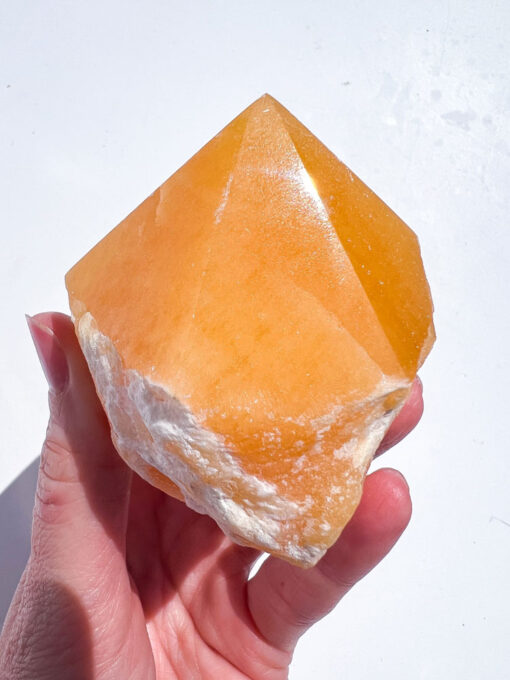 Orange Calcite half polished point