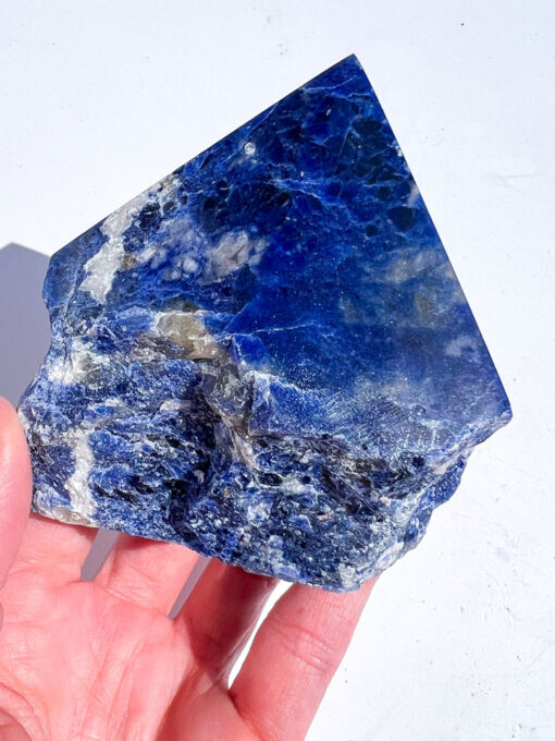 Sodalite half polished point