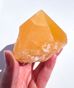 Orange Calcite half polished point