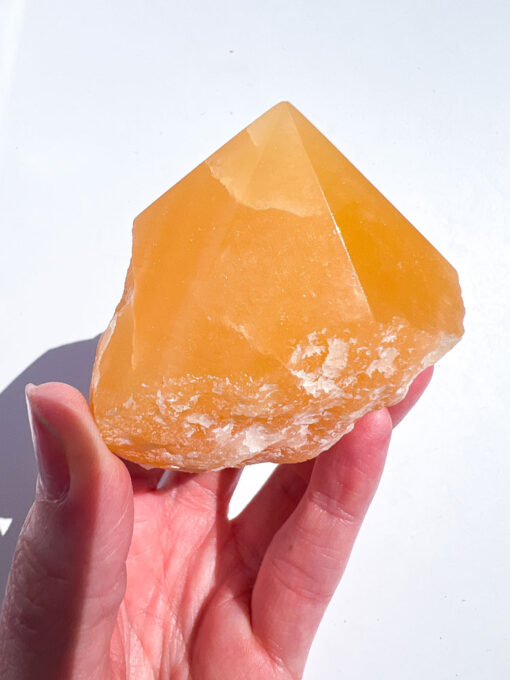 Orange Calcite half polished point