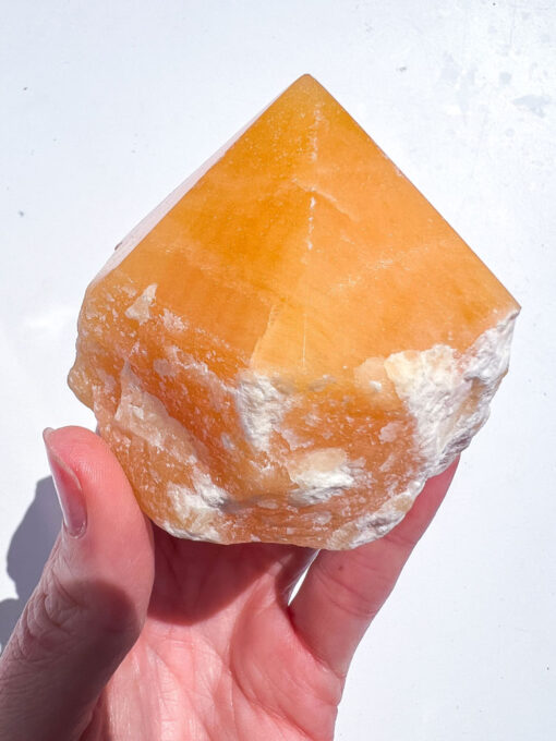 Orange Calcite half polished point