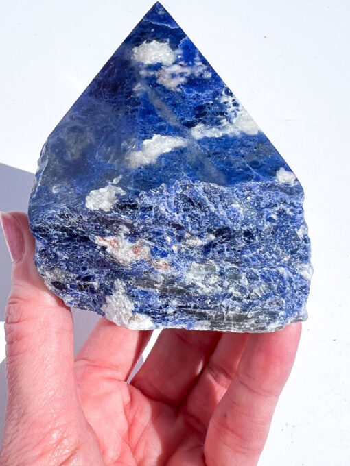 Sodalite half polished point