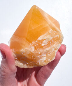 Orange Calcite half polished point