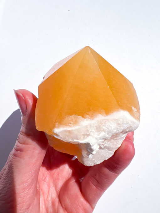 Orange Calcite half polished point