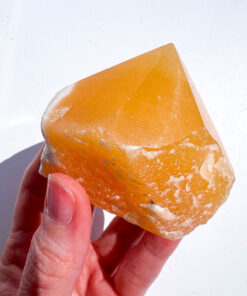 Orange Calcite half polished point