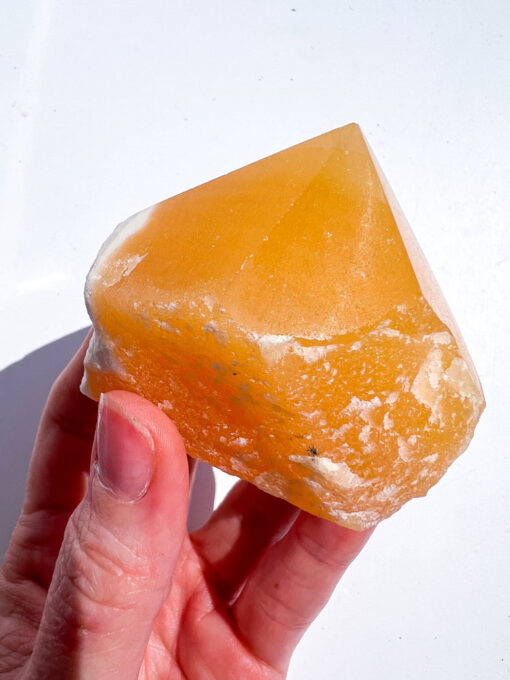 Orange Calcite half polished point