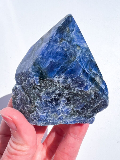 Sodalite half polished point