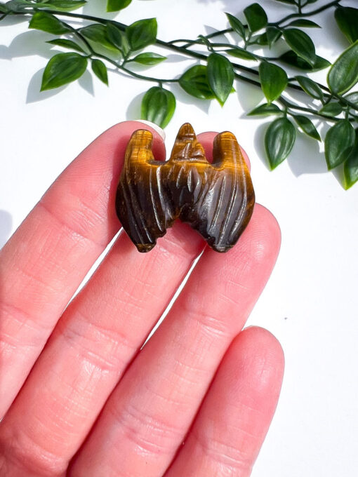 Tigers Eye bat carving