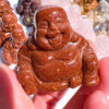 Goldstone laughing buddha carving