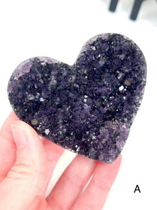 Amethyst heart cluster on a stand