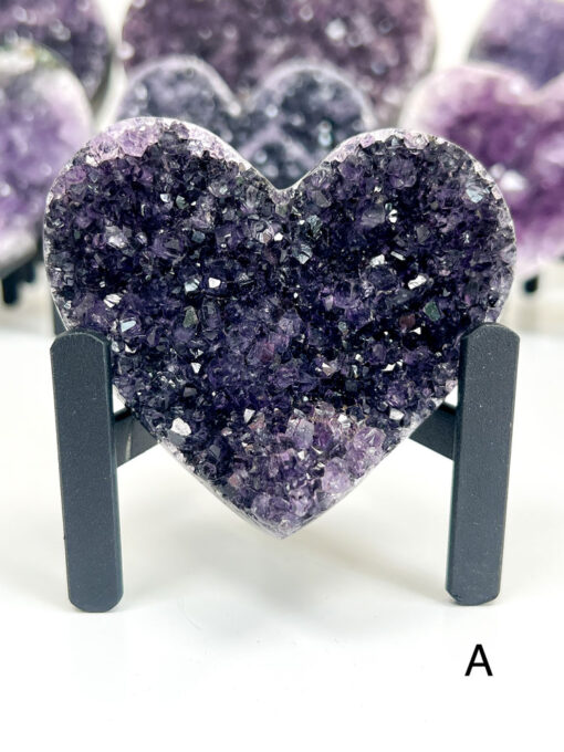 Amethyst heart cluster on a stand